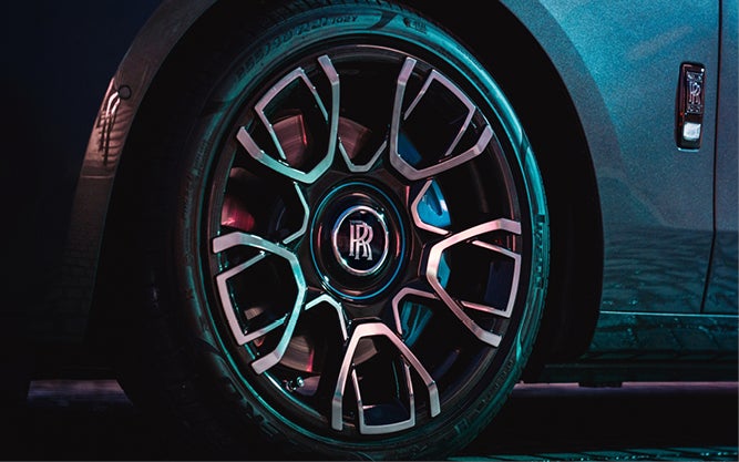 Striking callipers, available in four statement hues, are circled by Carbon Alloy Composite Wheels - completely unique to Black Badge Ghost. 
