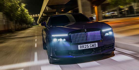 Driving down cityscape at night