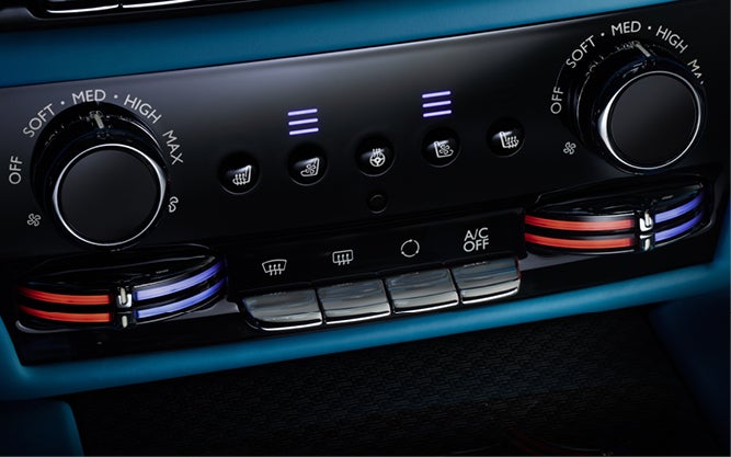 interior stereo with radio buttons and turn knobs